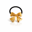 woman wearing 18k gold plated hair cuffs in sleek ponytail